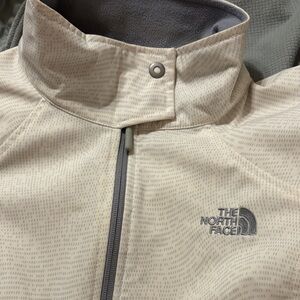 The North Face woman’s Light Gray Performance Jacket